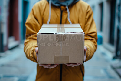 Delivery, cardboard box and man holding a package for courier business company or moving in concept. Closeup, cropped and parcel handover to consumer for online shopping, ecommerce or shipment