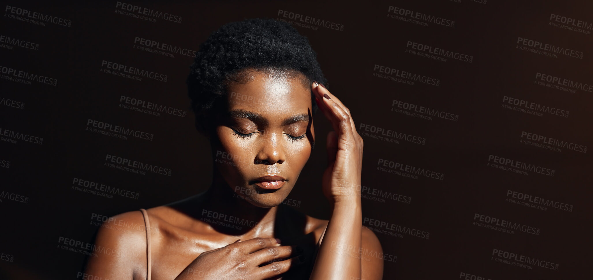 Buy stock photo Face, hands and beauty with a natural black woman on a dark background in studio for feminine wellness. Portrait, skincare and spa with a young model touching her body or skin in satisfaction