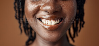 Woman, teeth closeup or smile for dental care, oral hygiene or healthy wellness on brown background. Mouth, lips or face of a happy model in studio for tooth whitening, beauty or dentist treatment