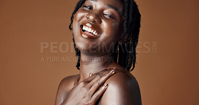 Face, beauty and skincare with happy black woman in studio isolated on brown background for wellness. Portrait, aesthetic and smile for foundation cosmetics or dermatology with a natural young person