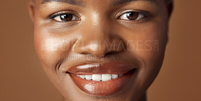Face of black woman, natural beauty or glow for wellness, cosmetics or healthy skin in studio. Dermatology, closeup or happy African girl model with smile or skincare results on brown background