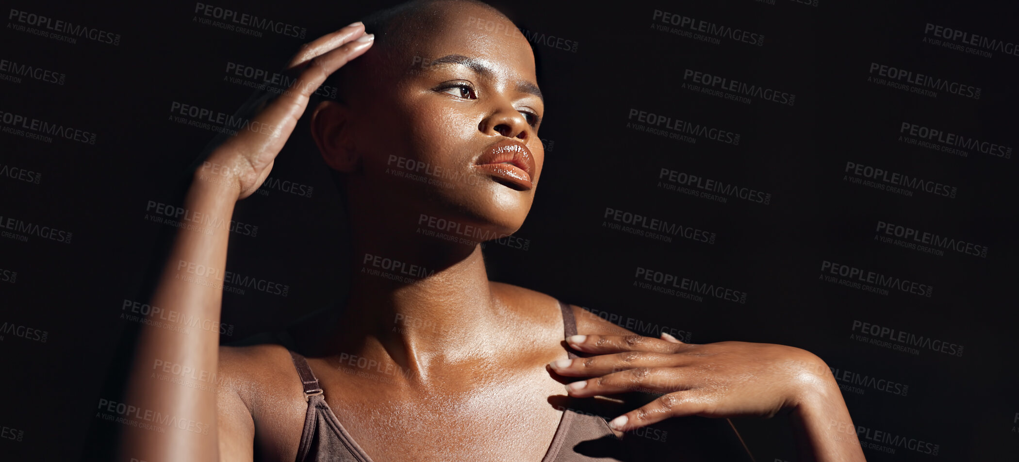 Buy stock photo Face, vision and beauty with a natural black woman on a dark background in studio for feminine wellness. Hands, skincare and thinking with a young model touching her body or skin in satisfaction