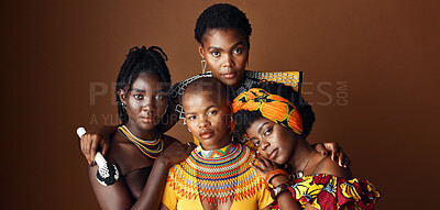 African women, group and studio for culture with face, jewelry or beads necklace in clothes by background. Black people, model and indigenous fashion for friends, traditional or portrait for kwanzaa