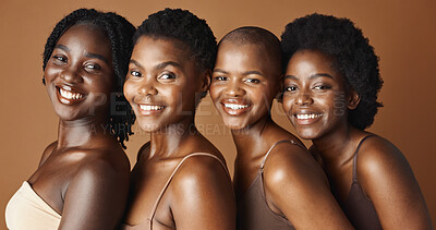 Face, beauty and smile with black woman friends in studio on a brown background for natural wellness. Portrait, skincare and happy with a group of people looking confident at antiaging treatment