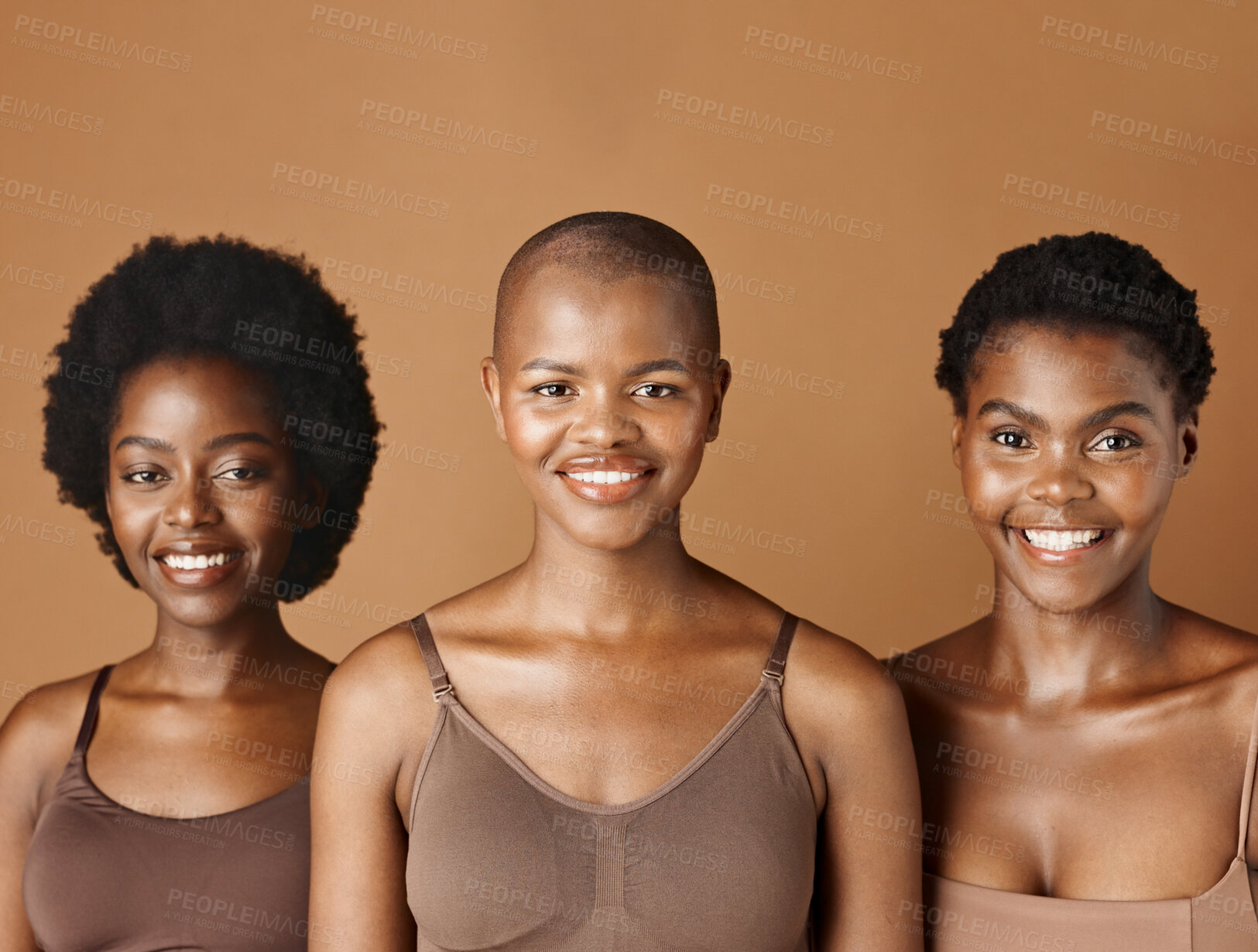 Buy stock photo Face, skincare and natural with black woman friends in studio on a brown background for a wellness routine. Portrait, aesthetic and smile with a group of people looking happy at beauty treatment