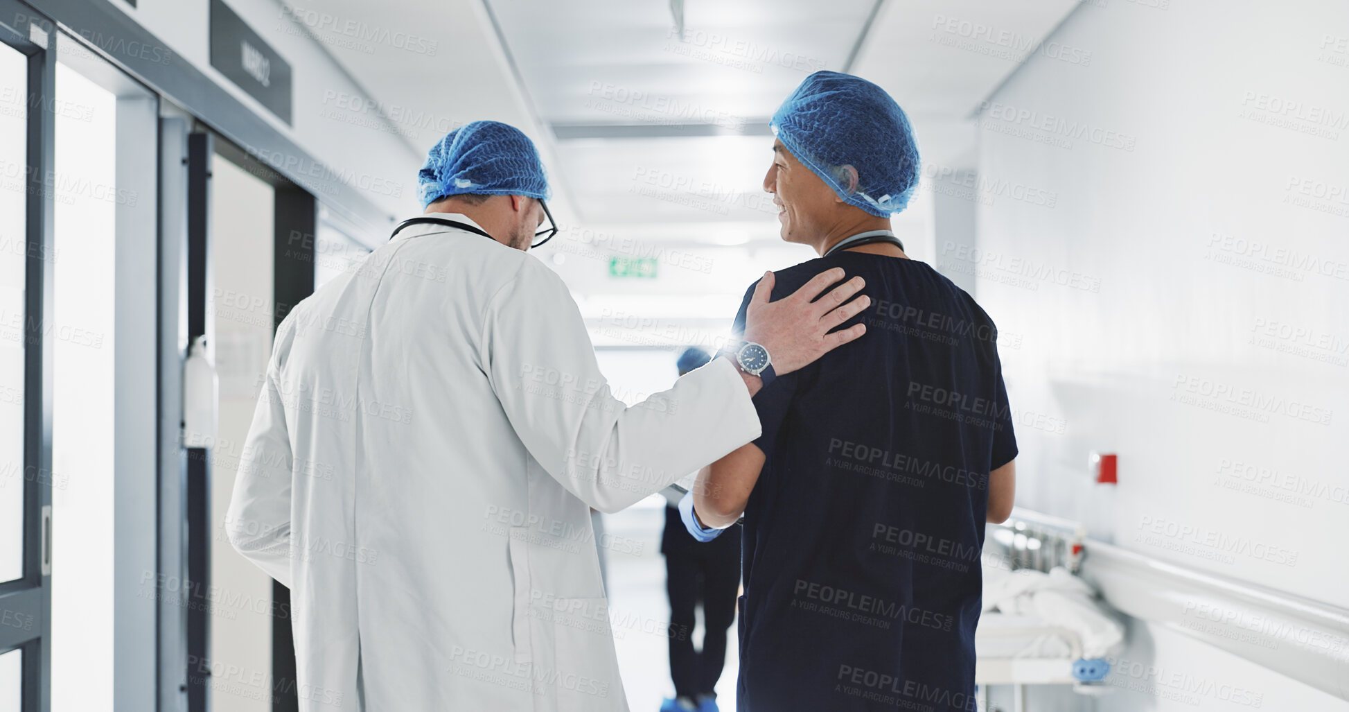 Buy stock photo Doctor, nurse and talk while walk in hospital with advice, consult or communication with medical team. People, discuss or coaching for patient care, treatment and wellness after surgery with joke