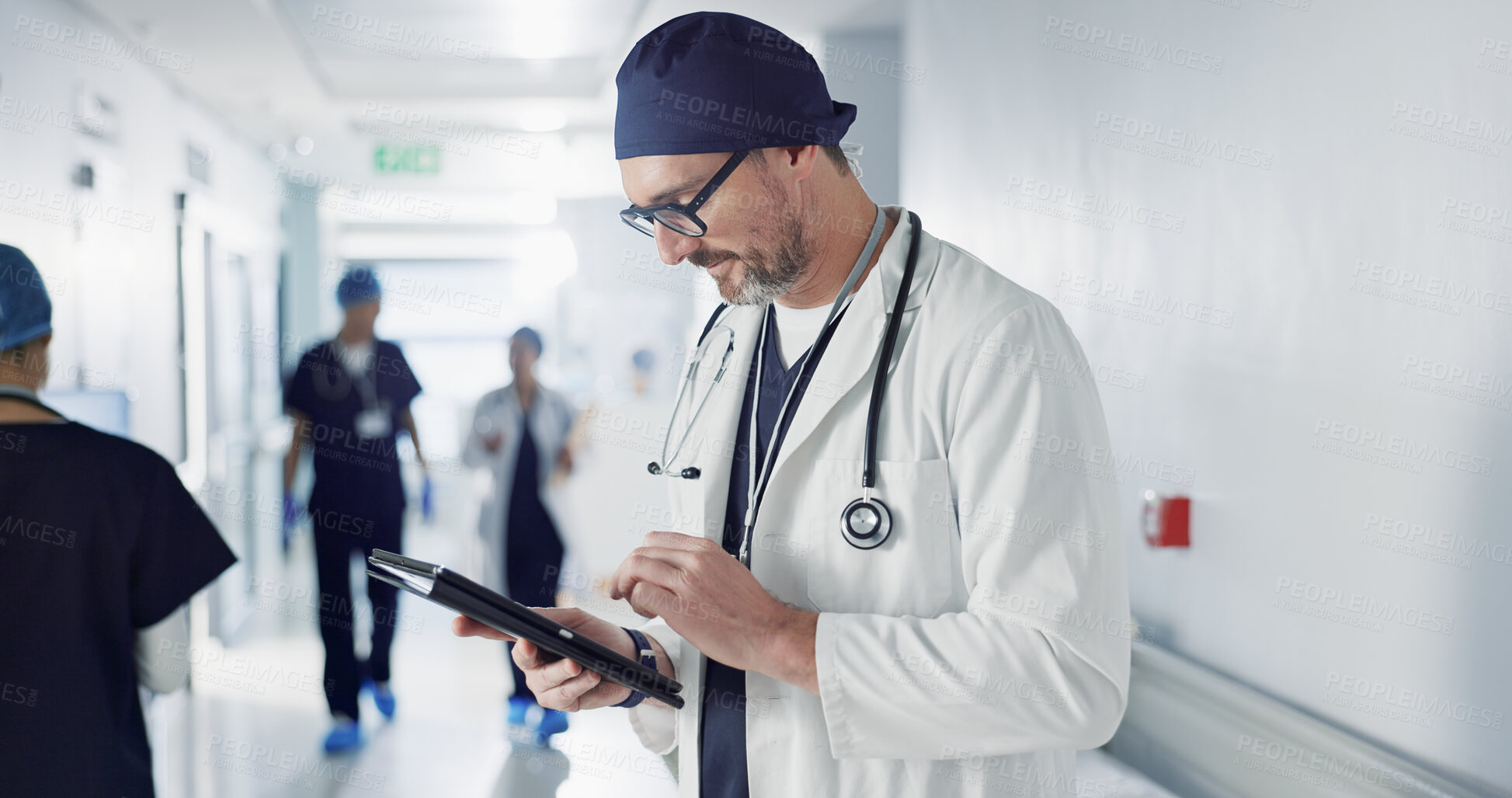 Buy stock photo Man, doctor and tablet for hospital, healthcare or clinic research, online planning and schedule management. Medical professional or surgeon typing on digital technology for surgery results or data