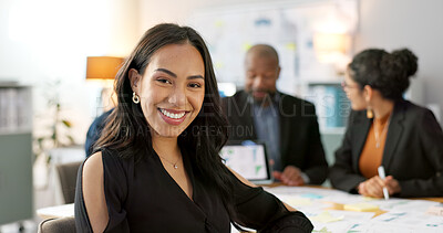 Meeting, smile and portrait of business woman with team planning or working on strategy together in startup company. Corporate, confident and professional employee at discussion in agency office