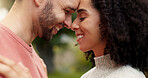 Forehead, nature and couple with love, smile and relationship with happiness, romantic and bonding. Romance, man and woman outdoor, dating and marriage with loving together, support and commitment