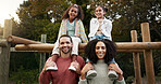 Happy family, relax and park in nature for holiday, weekend of fun bonding together in the outdoors. Portrait of Father, mother and children relaxing or enjoying time outside on piggyback in forest