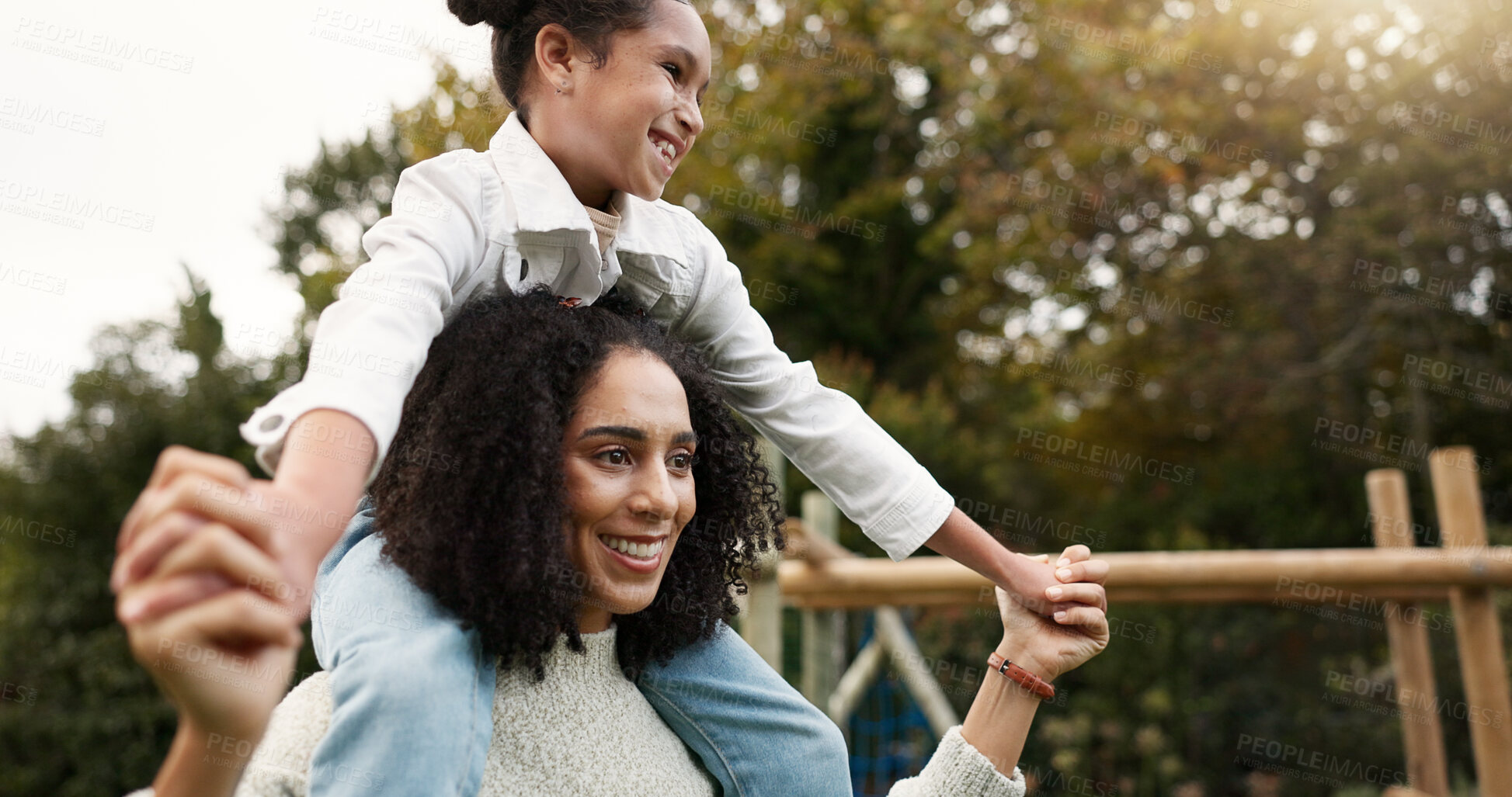 Buy stock photo Mother, daughter and piggyback walking in park or garden for fun bonding, holiday or weekend outside. Happy mom carrying her child on shoulders for family time together in nature or forest by house