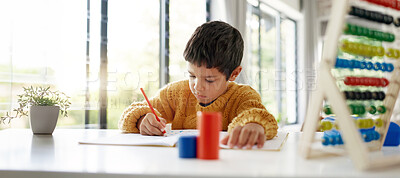 Student, drawing or child writing homework on notebook in kindergarten education for growth development. Project, creative boy or kid artist with color pencil learning or working on sketching skills
