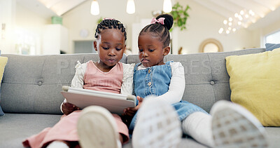 Black girl children, tablet on sofa and online with elearning or watching cartoon movie, sisters at home and screen time. Young female kids, streaming and subscription to education app or film