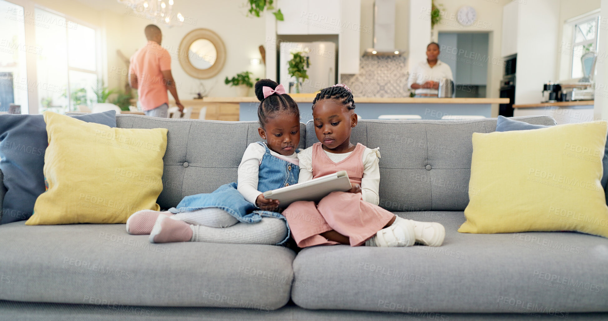 Buy stock photo Black girl children, relax with tablet on sofa and elearning or watching cartoon movie, sisters at home and screen time. Young female kids, streaming online and subscription to education app or film