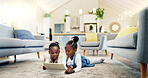 Black girl children on ground with tablet and relax, elearning or watch cartoon movie, sisters at home and screen time. Young female kids, streaming online and subscription to education app or film