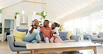 Support, black family on sofa and in living room of their home happy together smiling. Support or care, happiness or bonding time and African people cuddle on couch in their house for positivity