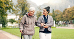 Senior woman, walker and nurse outdoor in a park with healthcare for elderly exercise. Walking, healthcare professional and female person with peace and physical therapy in a public garden with carer