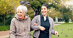 Senior woman, walker and nurse outdoor in a park with healthcare for elderly exercise. Walking, healthcare professional and female person with peace and physical therapy in a public garden with carer