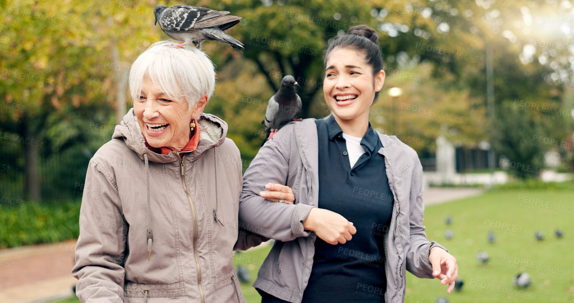 Buy stock photo Senior woman, walker and nurse outdoor in a park with healthcare for elderly exercise. Walking, healthcare professional and female person with peace and physical therapy in a public garden with carer