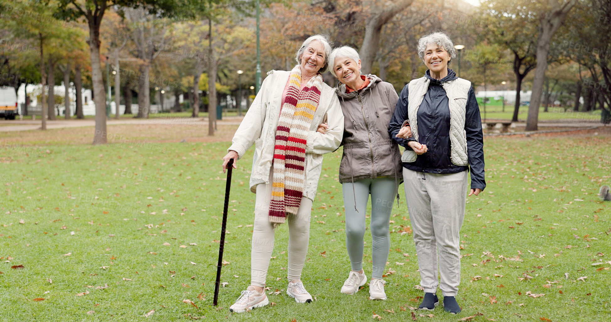 Buy stock photo Smile, retirement and senior friends in the park, laughing together while standing on a field of grass. Portrait, freedom and comedy with a group of elderly women in a garden for fun or humor