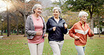 Senior women, walking and friends with fitness, wellness and workout for health in retirement. Park, exercise and elderly female group with motivation and power walk for cardio outdoor together