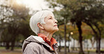 Freedom, nature and elderly woman breathing on vacation, holiday journey and winter travel. Park, fresh air and senior person outdoor for peace, calm and celebration for health, wellness and relax.