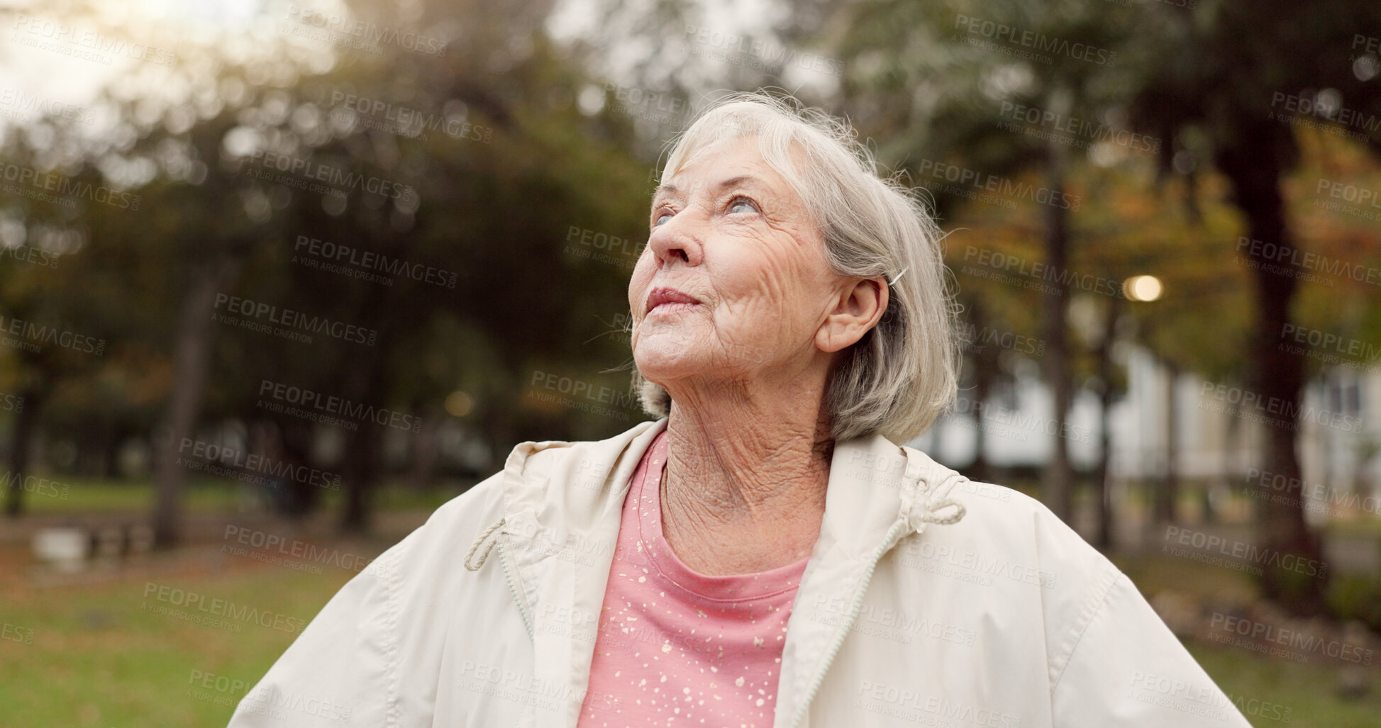 Buy stock photo Senior woman, thinking and outdoor at the park to breathe fresh air in nature or woods on walk in retirement. Happy, face and elderly person with wellness, happiness and positive mindset or gratitude