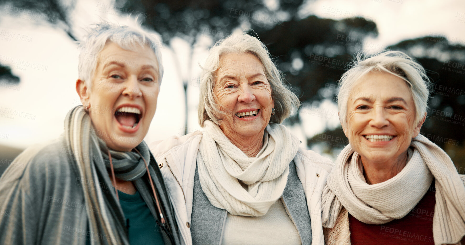 Buy stock photo Comic, laughing and senior woman friends outdoor in a park together for bonding during retirement. Portrait, smile and funny with a group of elderly people chatting in a garden for humor or fun
