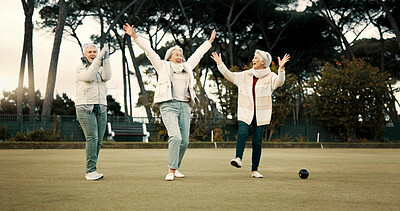 Senior women, celebration and park for sport, lawn bowling and happy for fitness, goal or applause in nature. Teamwork, elderly lady friends and metal ball for games, contest or win together on grass