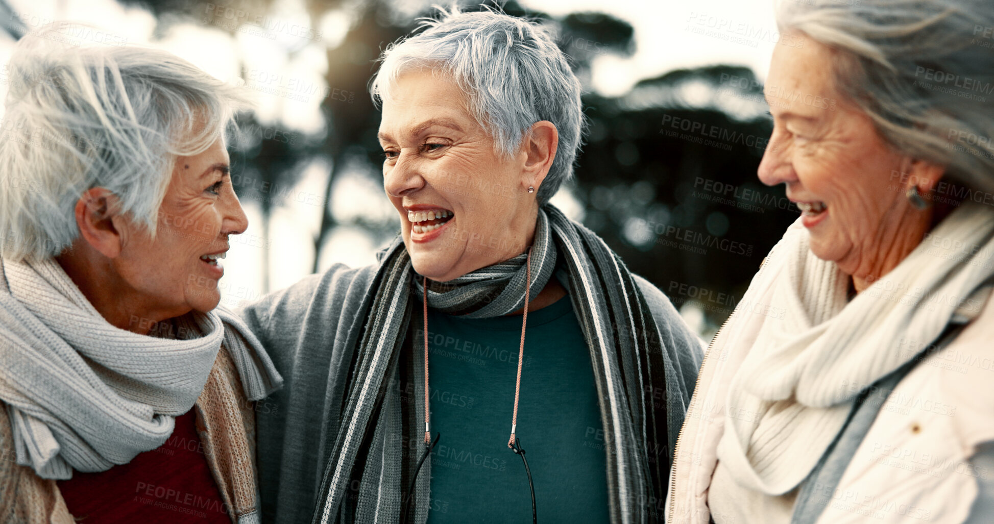 Buy stock photo Talking, laughing and senior woman friends outdoor in a park together for bonding during retirement. Happy, smile and funny with a group of elderly people chatting in a garden for humor or fun