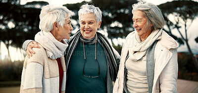 Talking, funny and senior woman friends outdoor in a park together for bonding during retirement. Happy, smile and laughing with a group of elderly people chatting in a garden for humor or fun