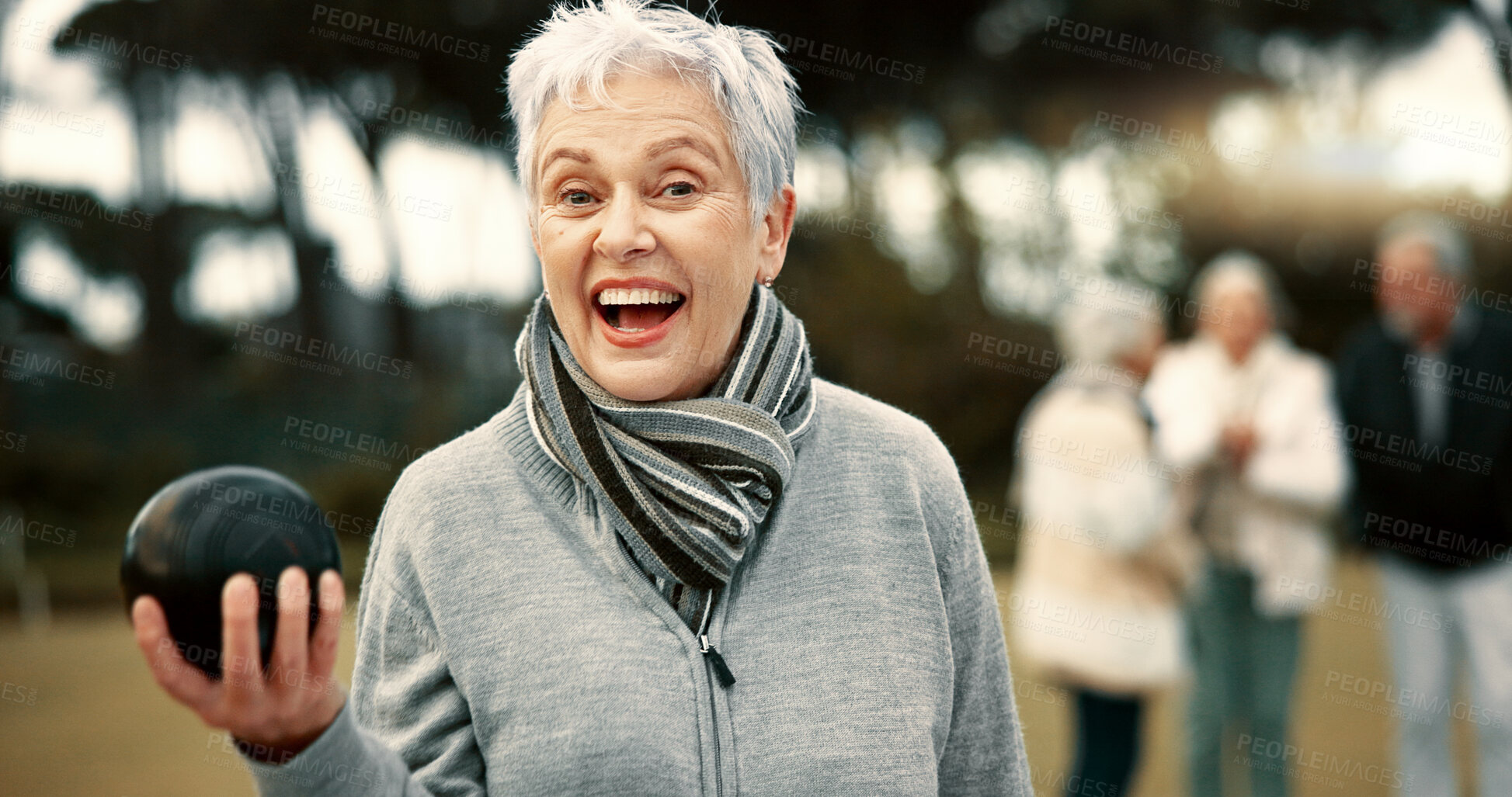 Buy stock photo Senior woman, lawn bowling and park with face for sport, fitness or game for competition, health or fun. Elderly lady, metal ball and grass for contest, excited smile or workout in outdoor portrait