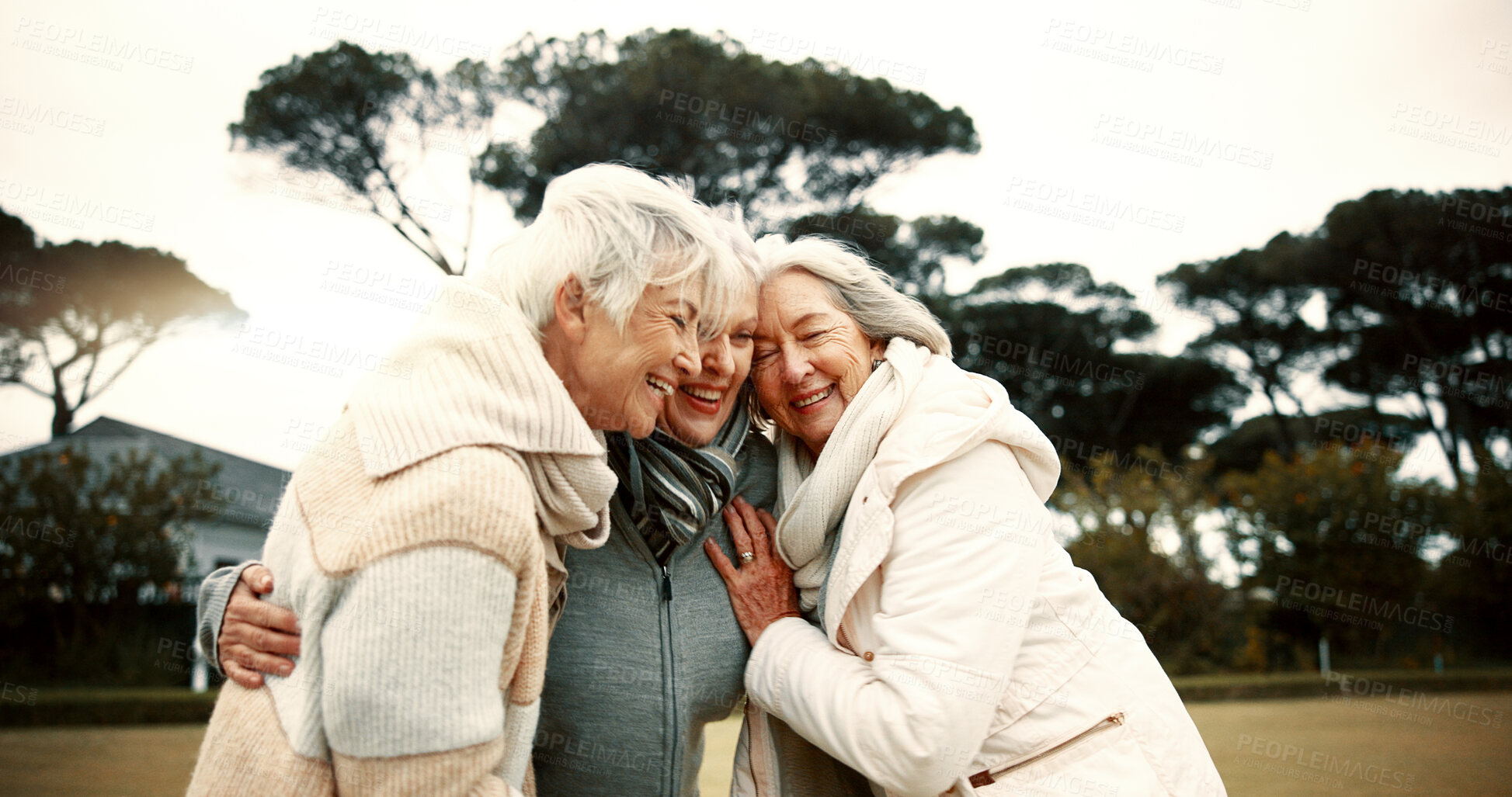 Buy stock photo Talking, laughing and elderly woman friends outdoor in a park together for bonding during retirement. Happy, smile and funny with a group of senior people hugging in a garden for humor or fun