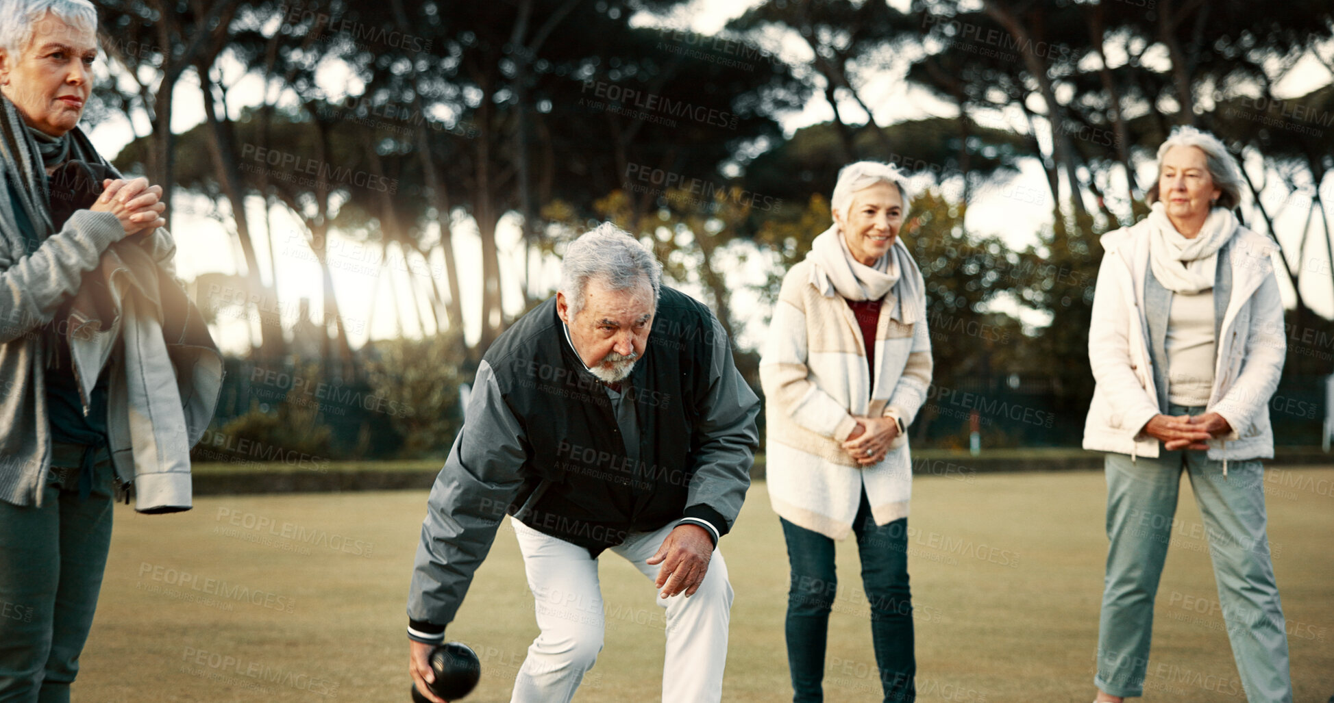 Buy stock photo Bowls, applause and celebration with senior friends outdoor, cheering together during a game. Motivation, support or community and a group of elderly people cheering while having fun with a hobby