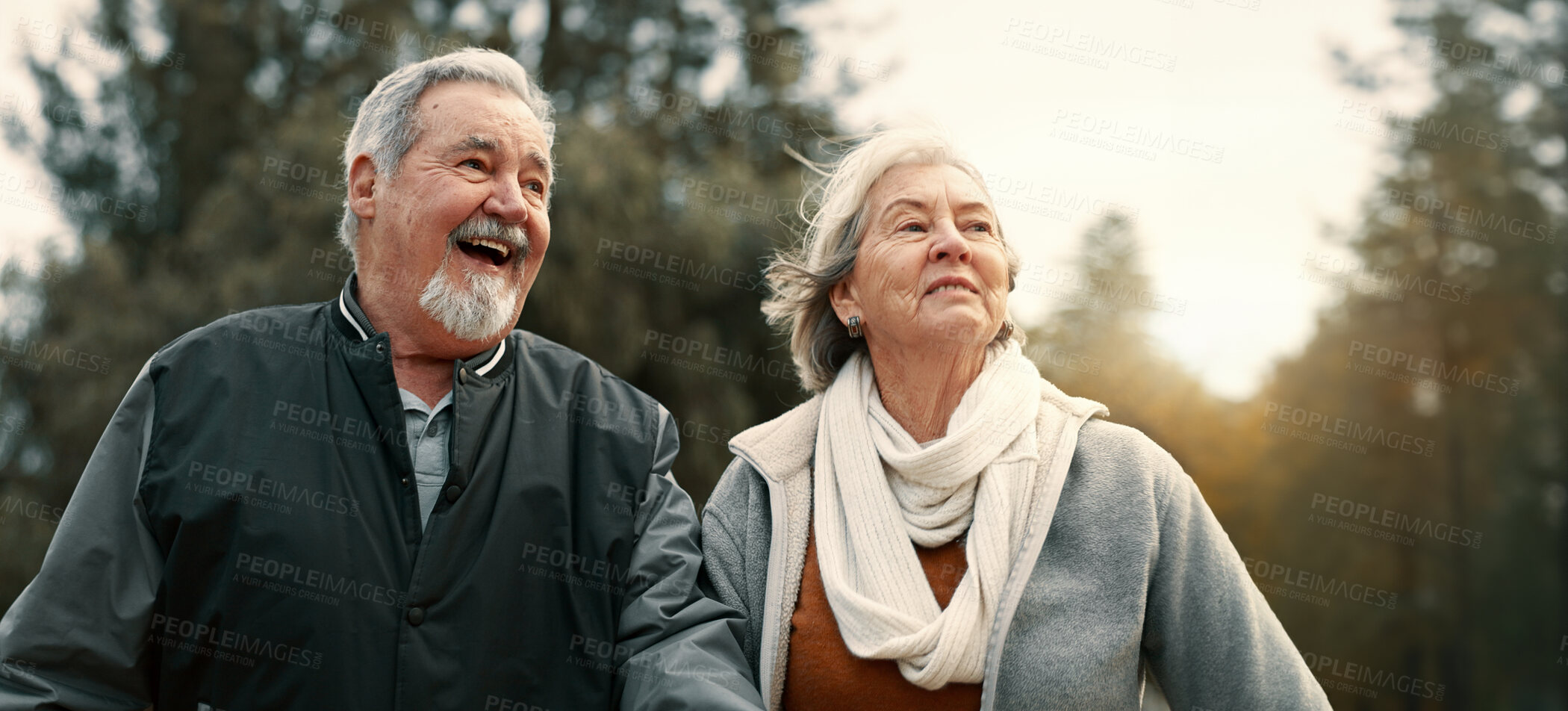 Buy stock photo Love, smile and a senior couple walking outdoor in a park together for a romantic date during retirement. Happy, care or excited with an elderly man and woman bonding in a garden for romance