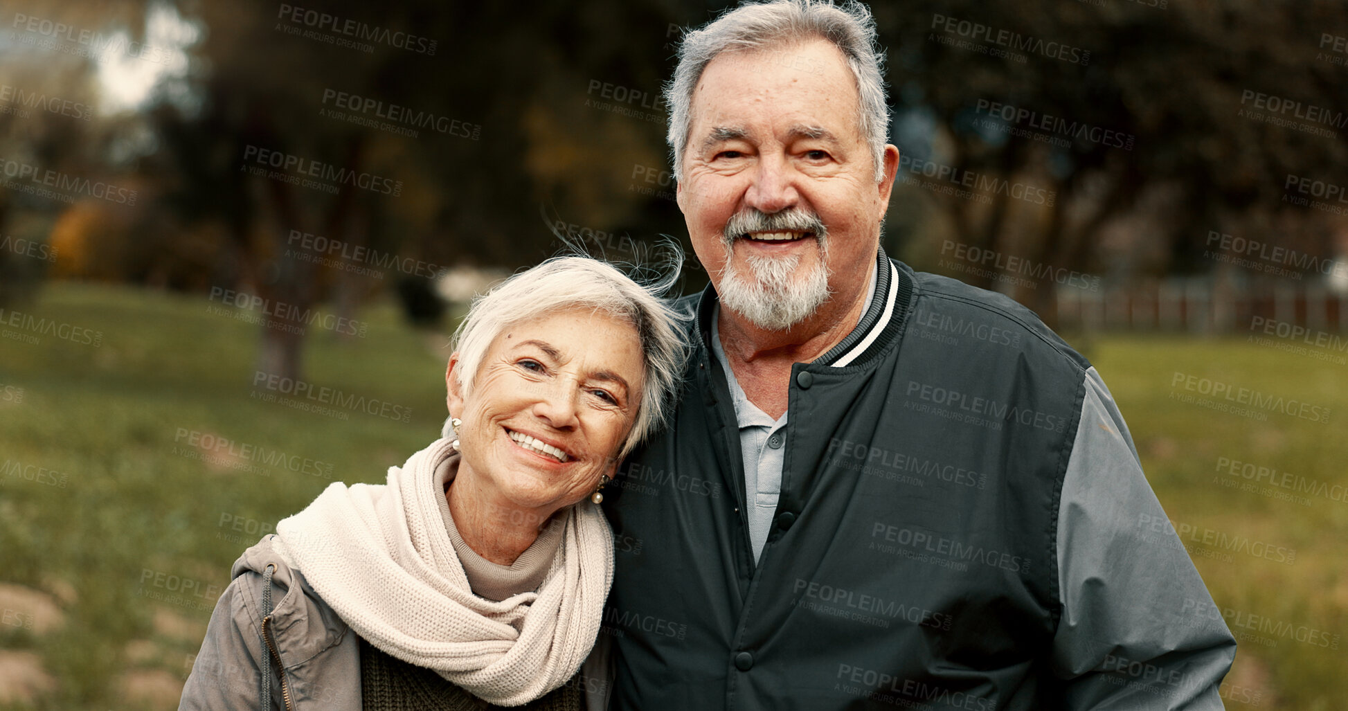 Buy stock photo Face, love and happy with a senior couple outdoor in a park together for a romantic date during retirement. Portrait, smile or care with an elderly man and woman bonding in a garden for romance