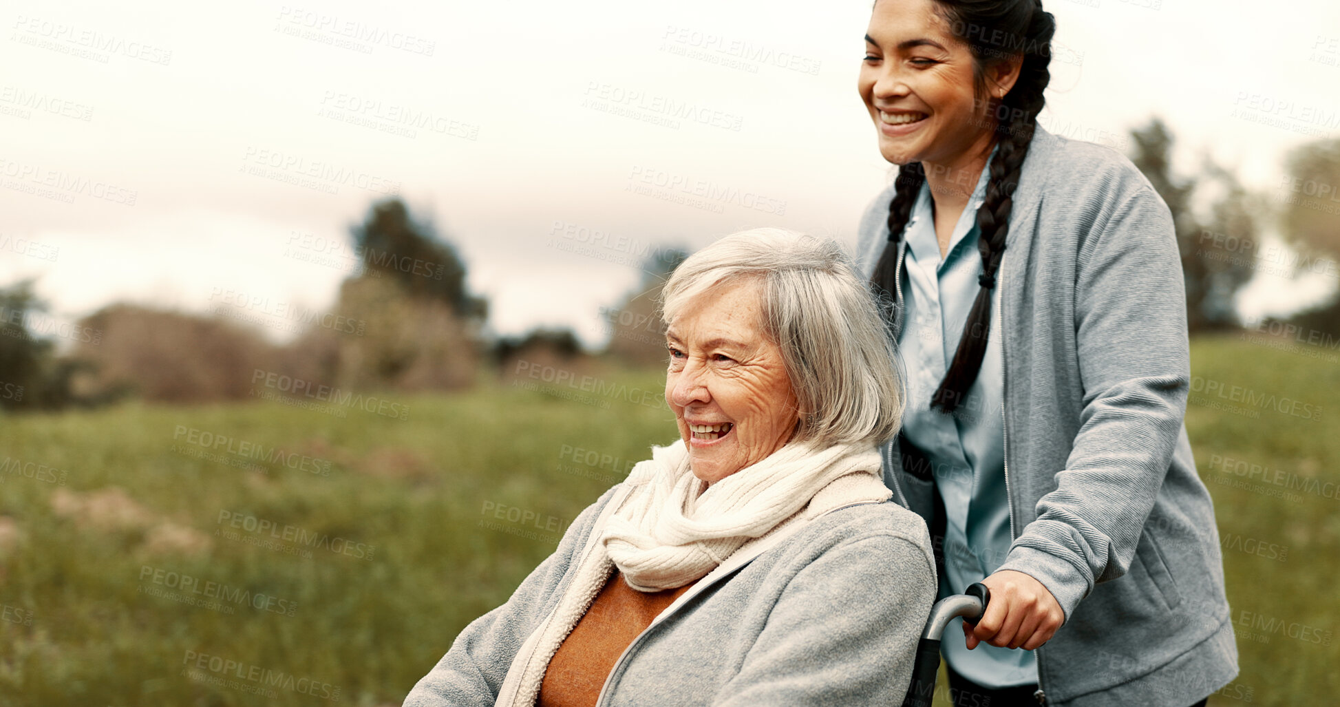 Buy stock photo Happy, senior woman and outdoor with caregiver, nurse or healthcare service for person with a disability and wheelchair. Face, smile and elderly lady in park with care or support in retirement