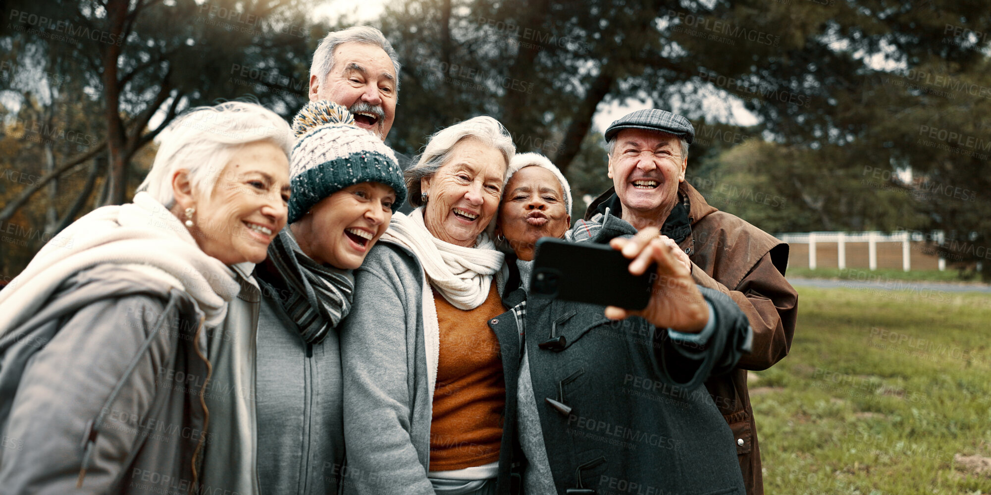Buy stock photo Excited, selfie and group of senior friends in outdoor green environment for fresh air. Diversity, happy and elderly people in retirement taking picture together while exploring and bonding in a park