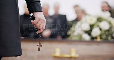 Funeral, religion and hands with rosary for memorial service, death ceremony and obituary sermon. Christianity, burial and closeup of pastor or priest with religious symbol for gospel, faith and loss