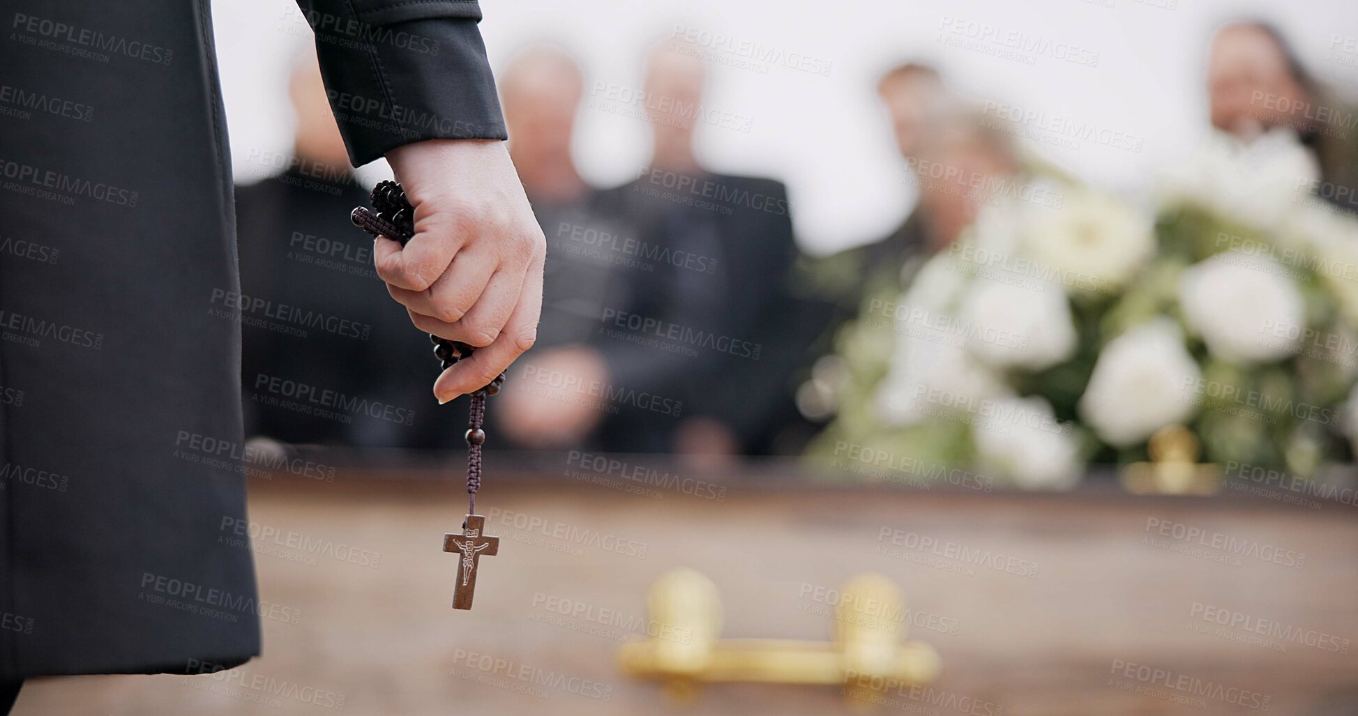 Buy stock photo Funeral, religion and hands with rosary for memorial service, death ceremony and obituary sermon. Christianity, burial and closeup of pastor or priest with religious symbol for gospel, faith and loss