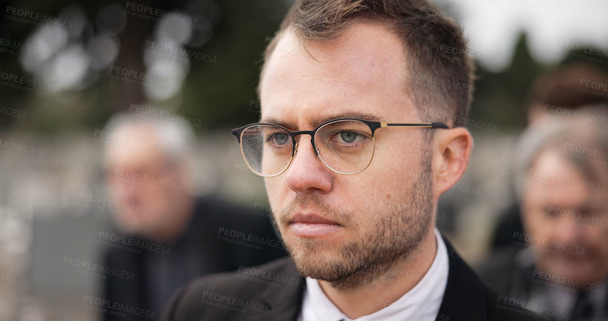 Buy stock photo Thinking, sad and a man at a funeral or graveyard with depression, problem or frustrated. Idea, mental health and a person at a cemetery and walking for mourning, grief or loss in the family