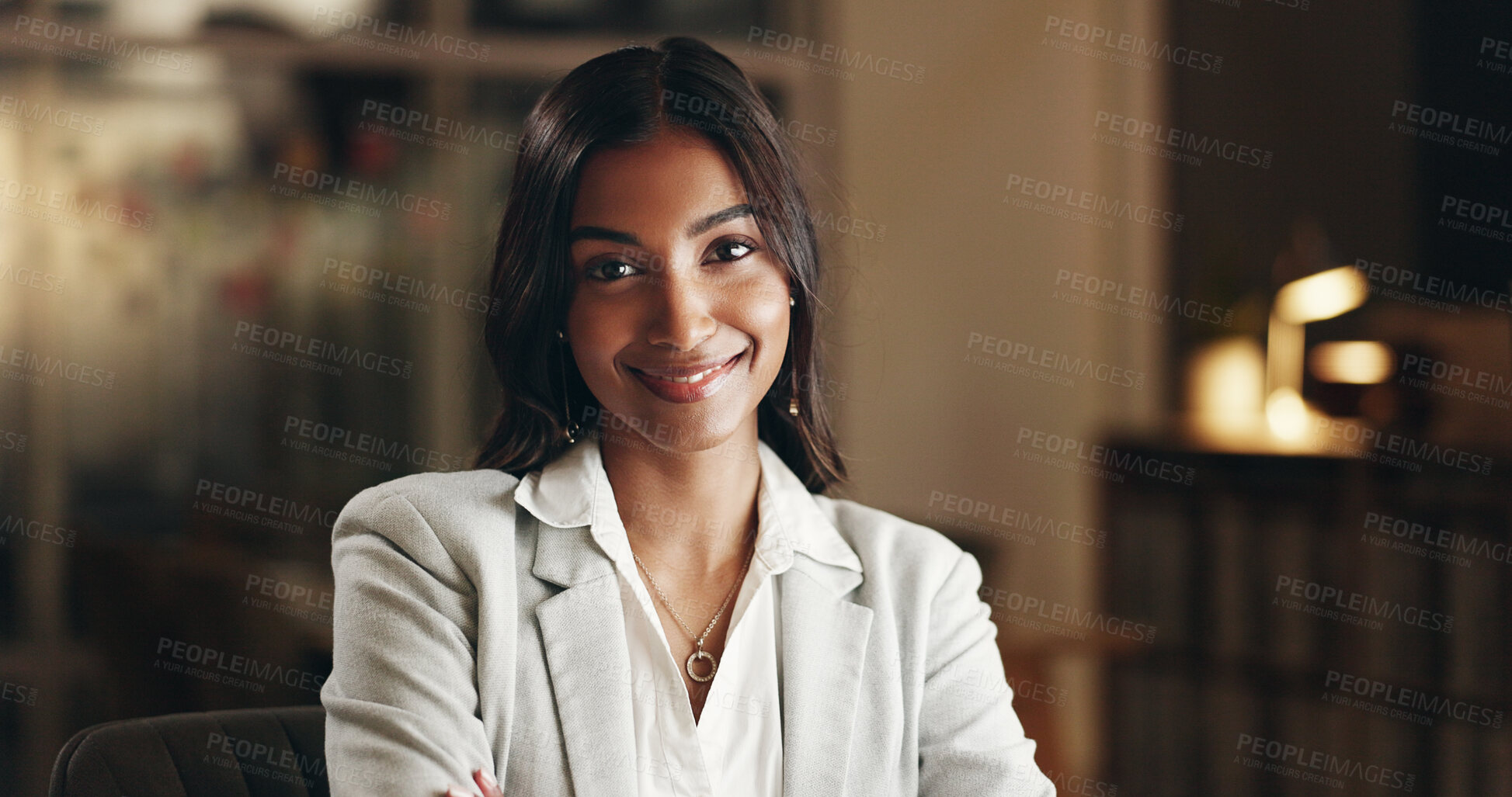 Buy stock photo Smile, night and face of business woman, office consultant or agent happy for overtime work, commitment or career. Pride, portrait and Indian person confident, professional and working late in agency