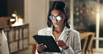 Tablet, overtime and businesswoman in office with glasses, reading email or social media post scroll, schedule or report. Planning, research and woman, late at night work and reflection of website.