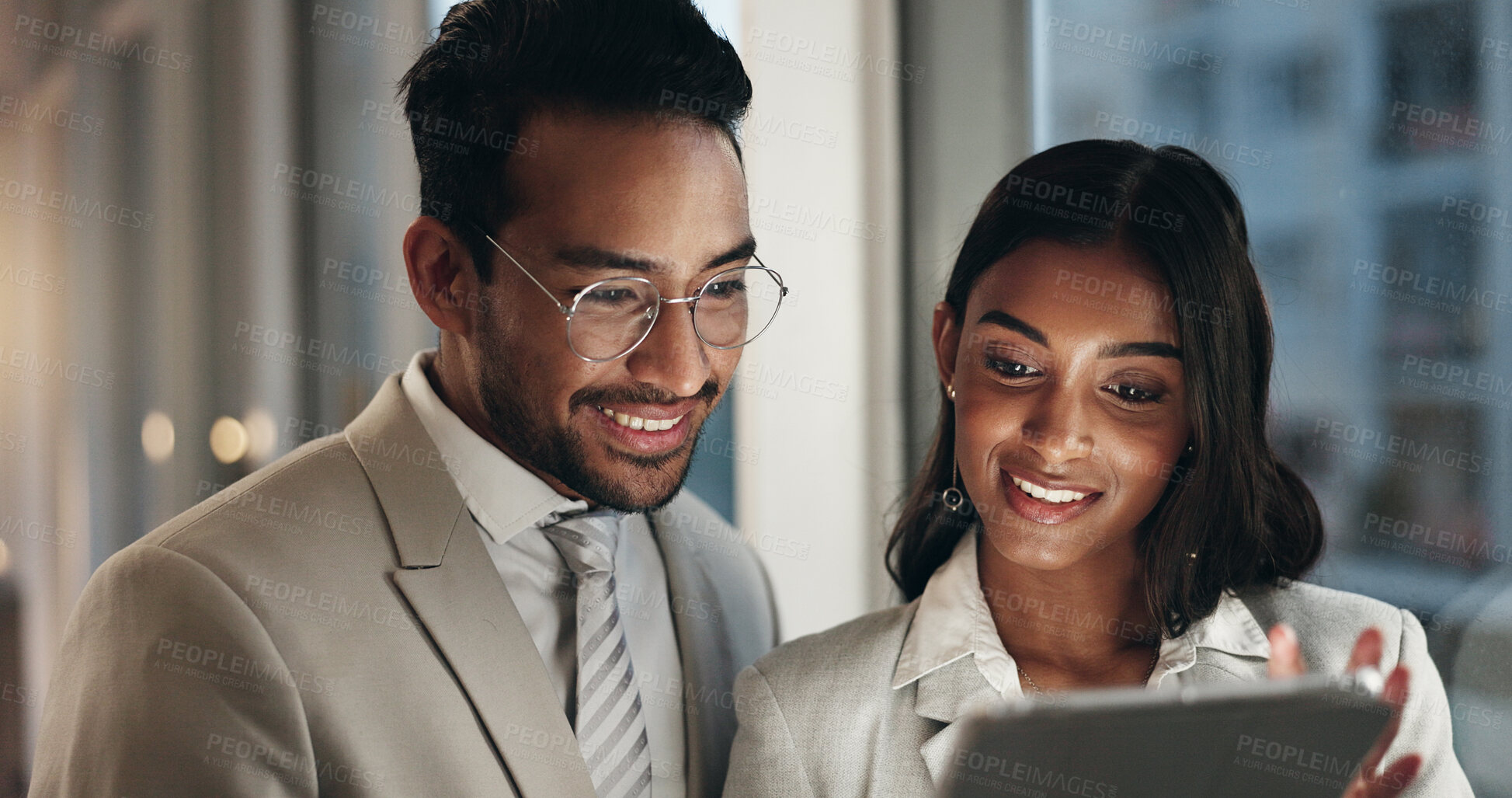 Buy stock photo Tablet, night and professional people collaboration, consulting and discussion on customer experience analysis. Reading, communication and media analyst team working on online project, report or plan