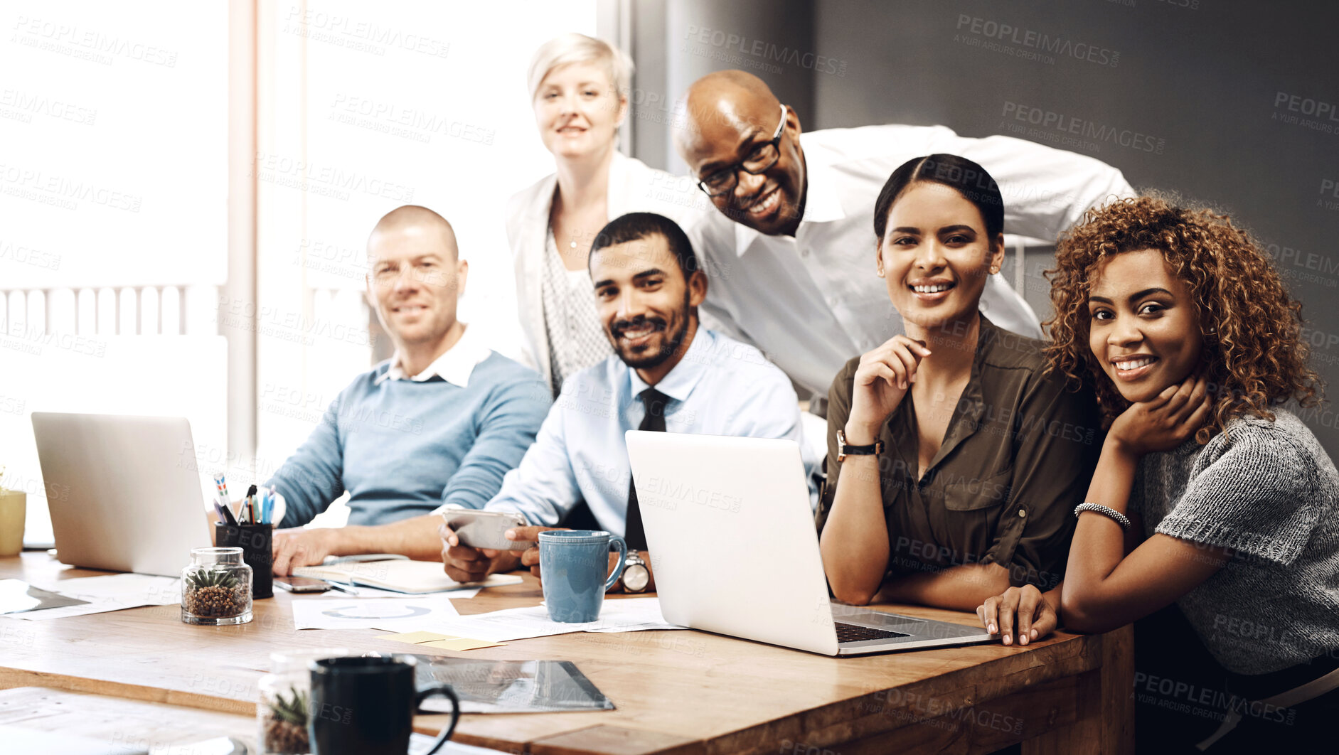 Buy stock photo Portrait of a group of businesspeople working in an office