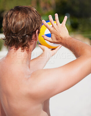 Buy stock photo Beach volleyball, sports and person serve ball for game, competition or tournament challenge, match or practice. Nature, summer activity or back of athlete doing fitness, exercise or training workout