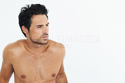 Buy stock photo Handsome man, face and relax on mockup looking away in thought or thinking on white studio background. Calm, genuine and attractive young male person or shirtless model posing in comfort for morning