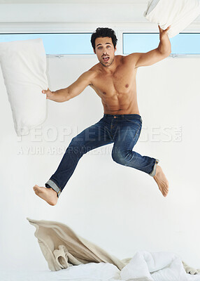 Buy stock photo Portrait, bed and jump with a shirtless man in his home for freedom, energy or fun on a weekend morning. Bedroom, excitement and the body of a masculine young person leaping in his apartment