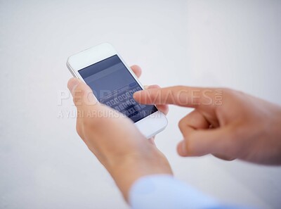 Buy stock photo Hands, phone and typing on screen for communication or text message in studio, texting and conversation. Smartphone, person and replying or speaking online, contact and discussion by white background