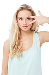Peace sign, eyes and portrait of woman on a white background with confidence, pride and attitude. Fashion, beauty and isolated person with hand gesture in trendy clothes, style and outfit in studio